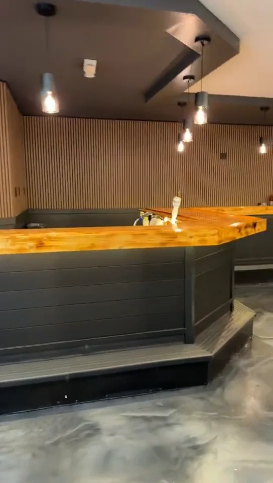 Event venue bar with metallic epoxy floor